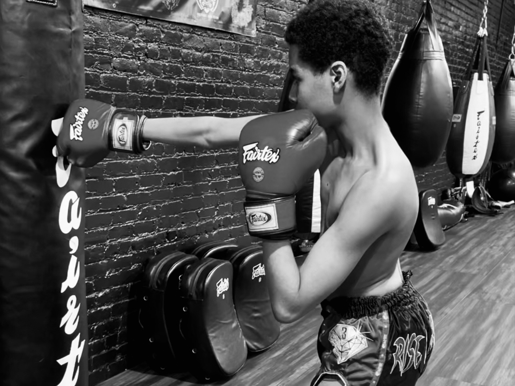  <h1>YOUTH PROGRAM</h1>Fun and skill filled class for 7-15 year olds. Students are taught beginner to intermediate level skills in this class through training on heavy bags, with partners on thai pads and simulated light contact exercises in a fun, safe environment which encourages respect, discipline and confidence. No previous experience required.